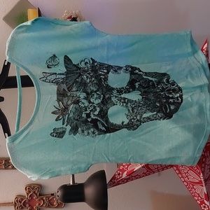 Mint green short sleeve knit tee with skull print.